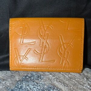 193. Yves Saint Laurent Leather Card Holder w/coa